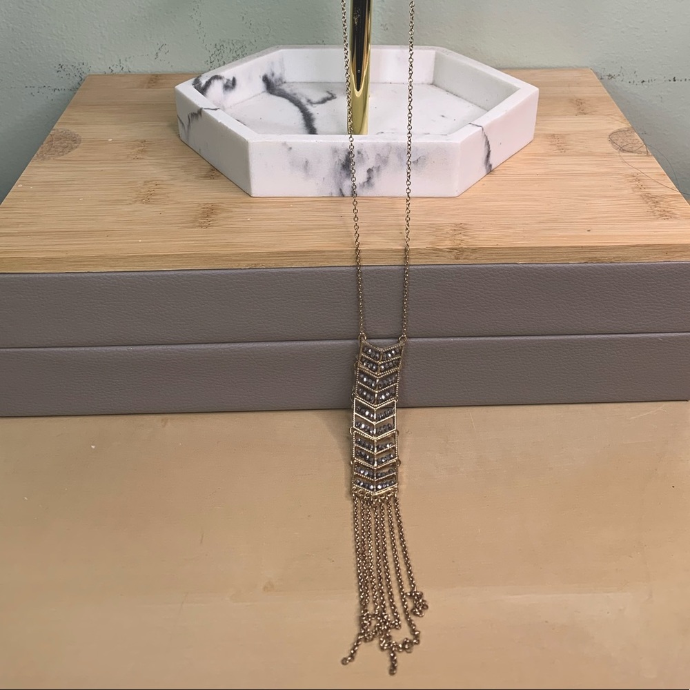 Drapey gold colored necklace